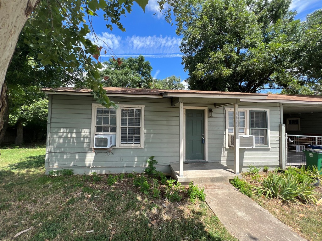 6608 Wild Street Austin, TX 78757 - Photo 1 of 1 front view of a house with a yard