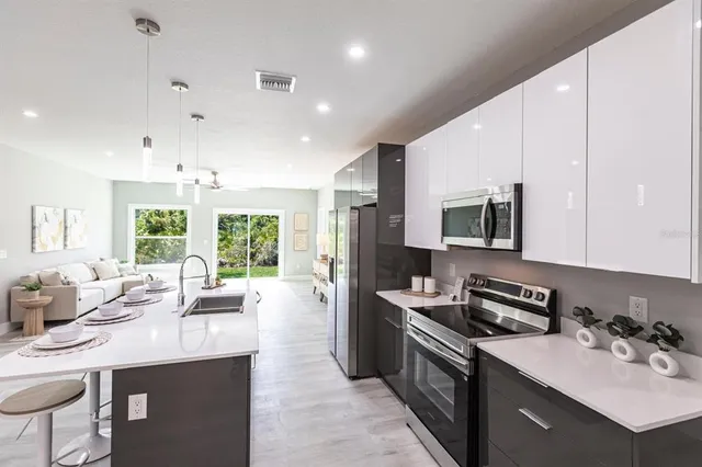 a view of a dining room with furniture