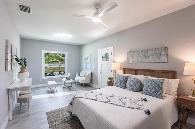 a bedroom with furniture and a couch