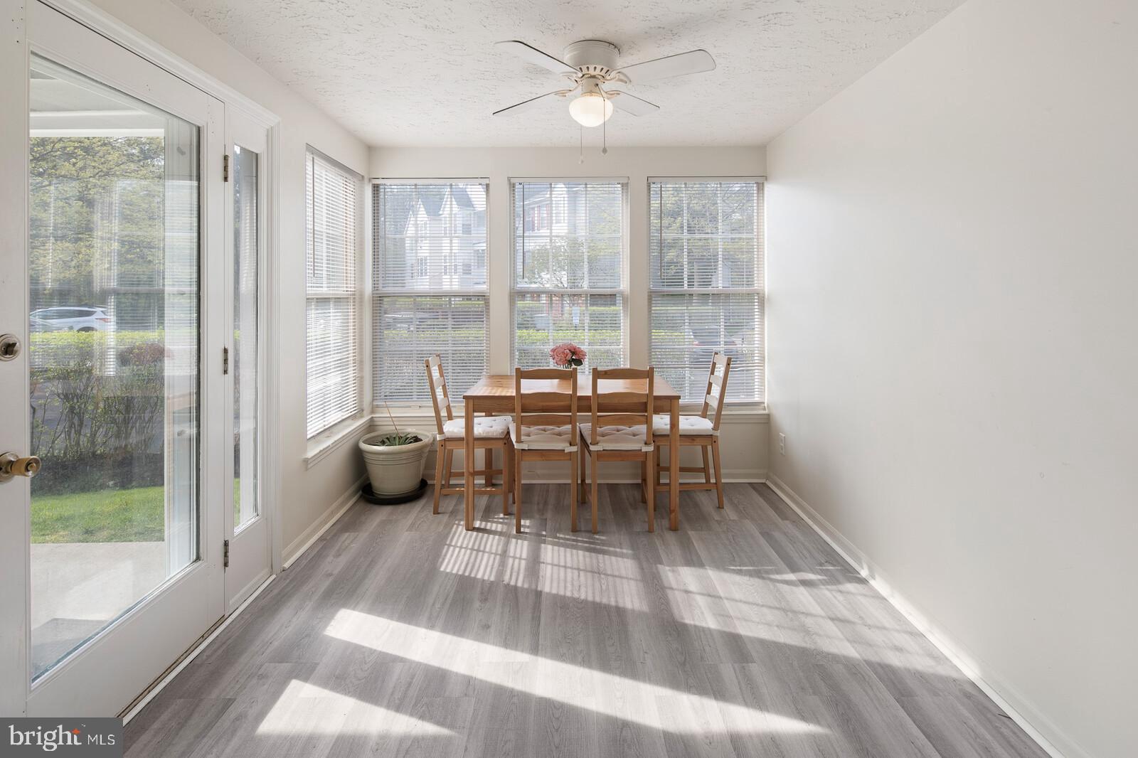 64 Eldon Way Marlton, NJ 08053 - Photo 2 of 29 dining area with large glass door leading to patio