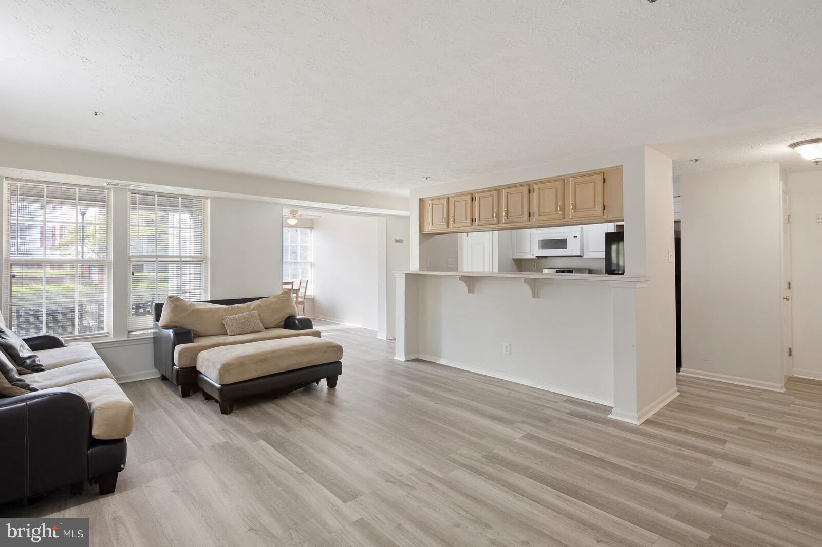 64 Eldon Way Marlton, NJ 08053 - Photo 5 of 29 family room open to the kitchen