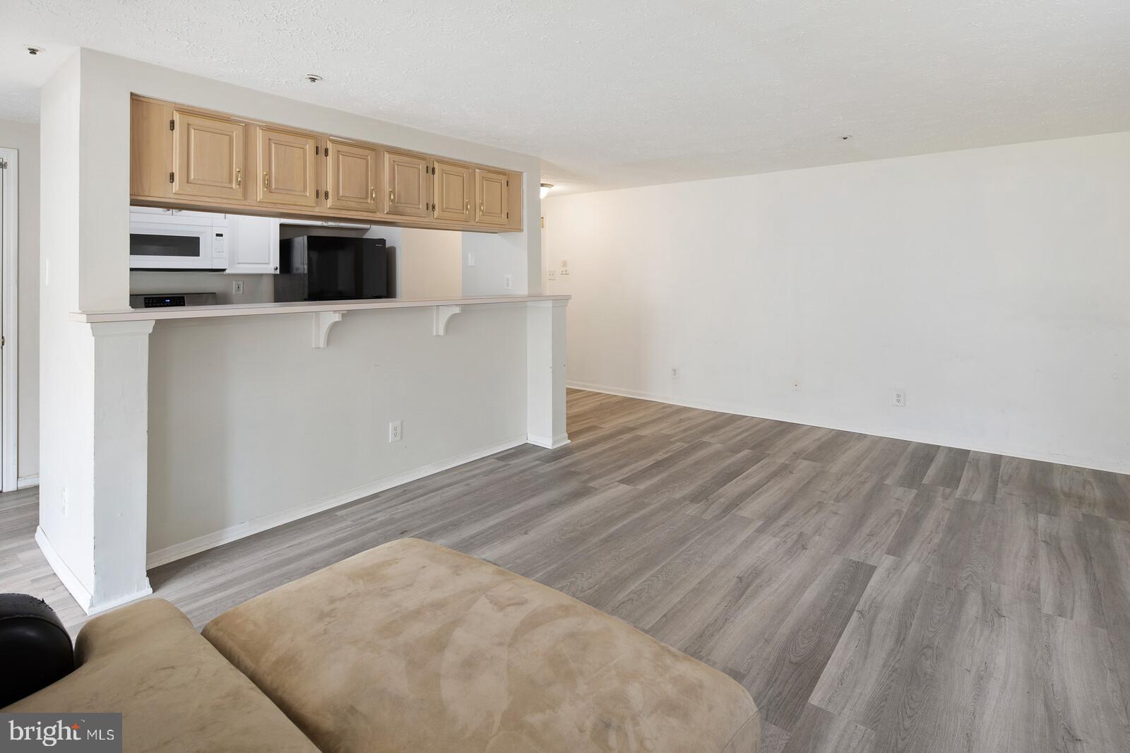 64 Eldon Way Marlton, NJ 08053 - Photo 6 of 29 family room with bar seating