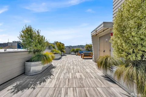 a view of a terrace with furniture