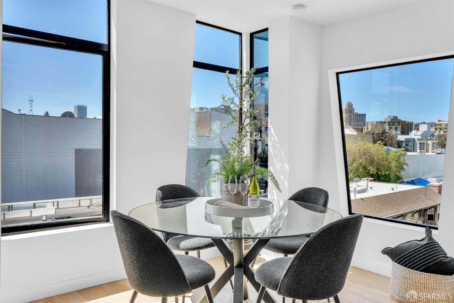 236 Shipley, Unit 405 San Francisco, CA 94107 - Photo 5 of 35 a view of a dining room with furniture and wooden floor