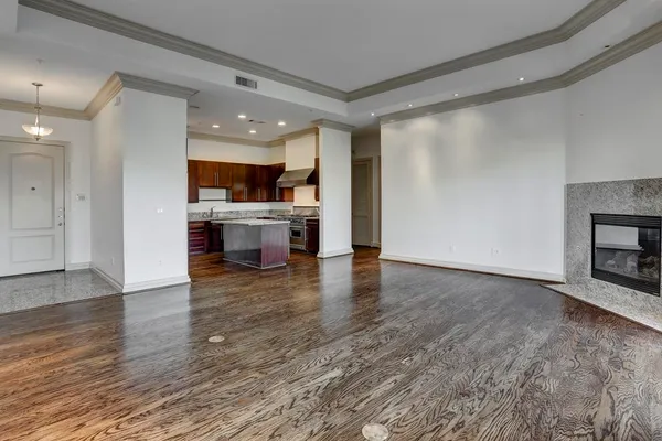 a view of a kitchen with a sink and a stove top oven