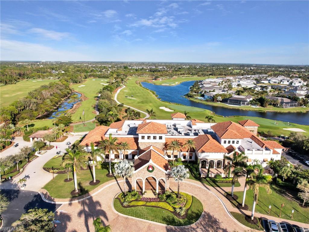 9584 Trevi Court, Unit 5213 Naples, FL 34113 - Photo 43 of 50 an aerial view of residential houses with outdoor space