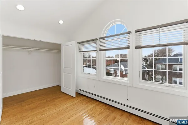 a view of a storage & utility room with washer and dryer