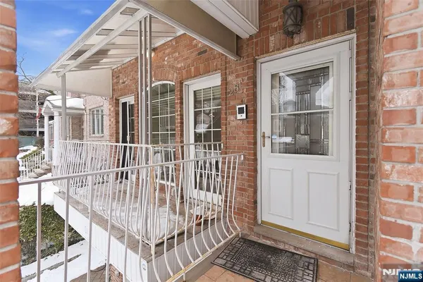 a view of a house with a glass door