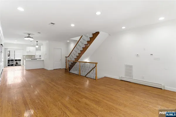 a view of a livingroom with a staircase
