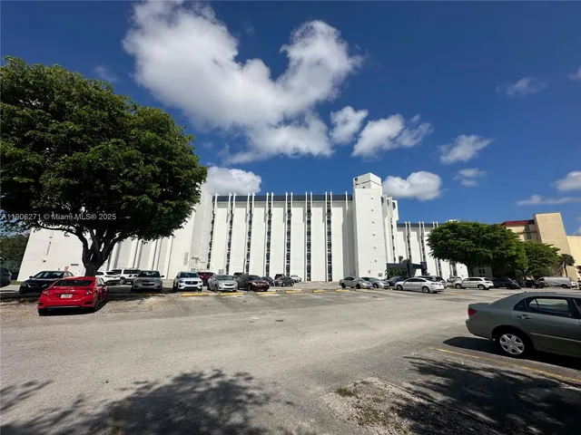 a view of a street with cars