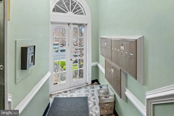 a view of entryway with wooden floor