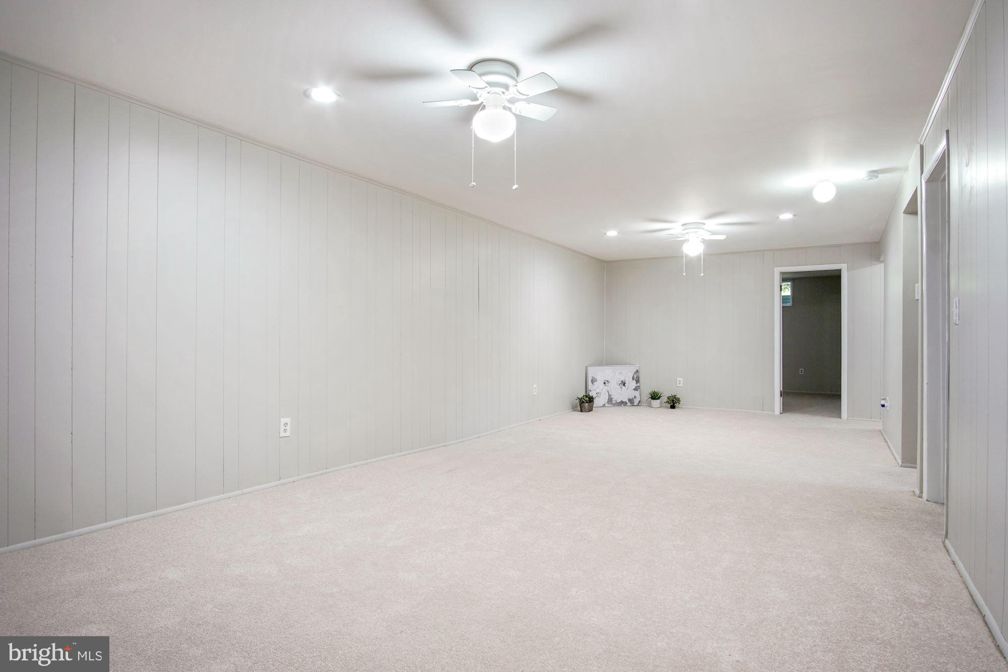 14541 Good Hope Road Silver Spring, MD 20905 - Photo 19 of 32 Huge family room with perfect lighting - basement