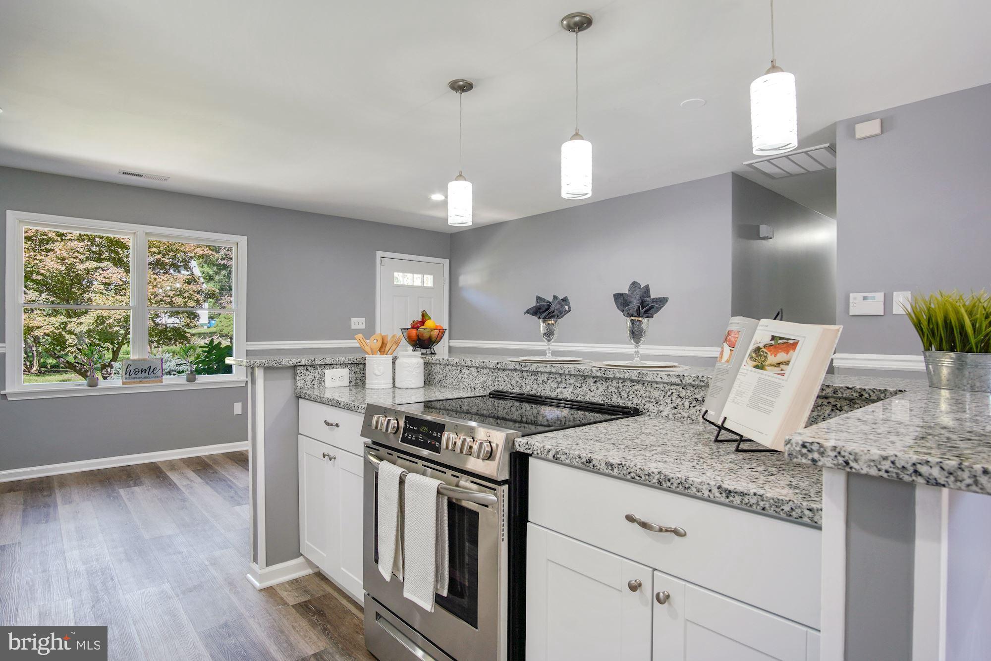 14541 Good Hope Road Silver Spring, MD 20905 - Photo 10 of 32 Granite counter top extends providing eating space