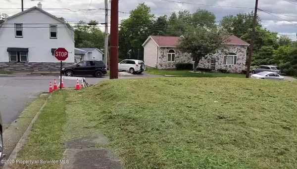 a view of house with yard