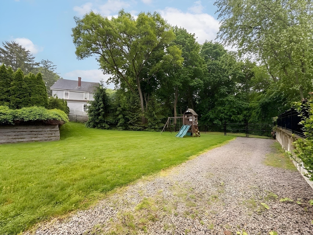 114 Curve Street Dedham, MA 02026 - Photo 26 of 27 a view of a park with a slide