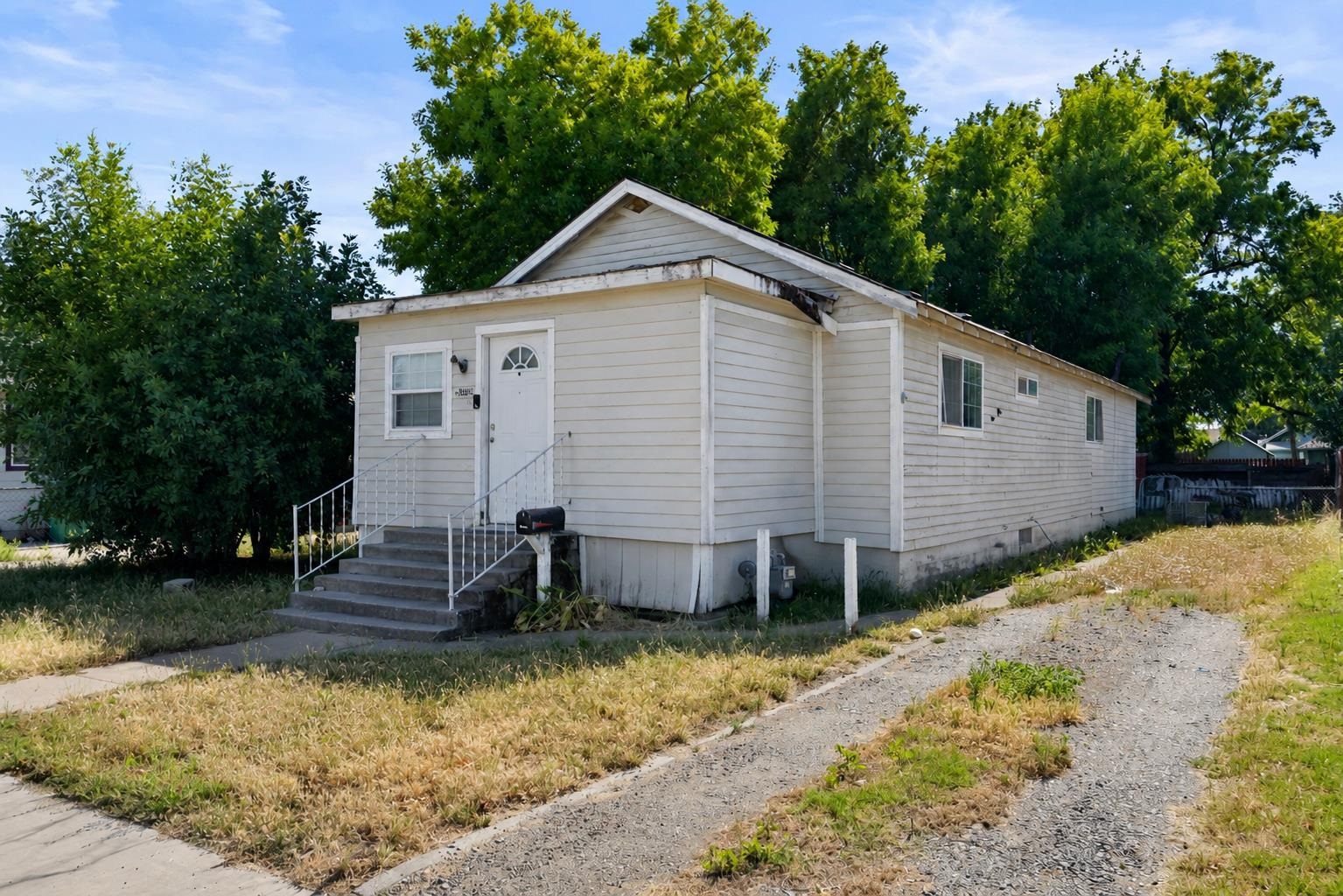 1220 5th Avenue Corning, CA 96021 - Photo 2 of 15 a view of house with backyard and garden