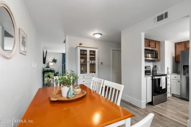 a view of a dining room with furniture