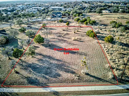 a view of outdoor space with swimming pool and lake view
