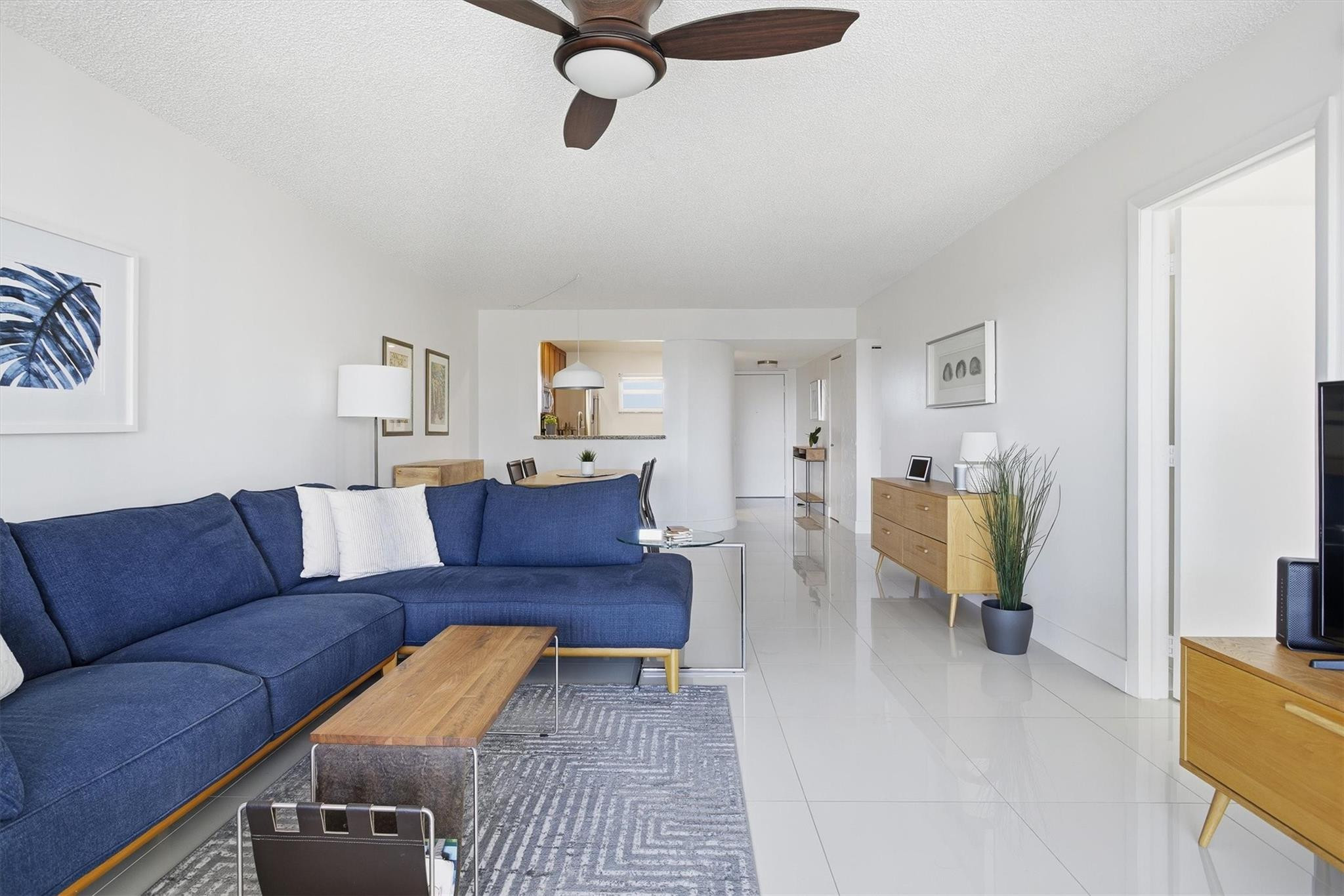3930 Inverrary Boulevard, Unit 605D Fort Lauderdale, FL 33319 - Photo 12 of 52 a living room with furniture and a couch