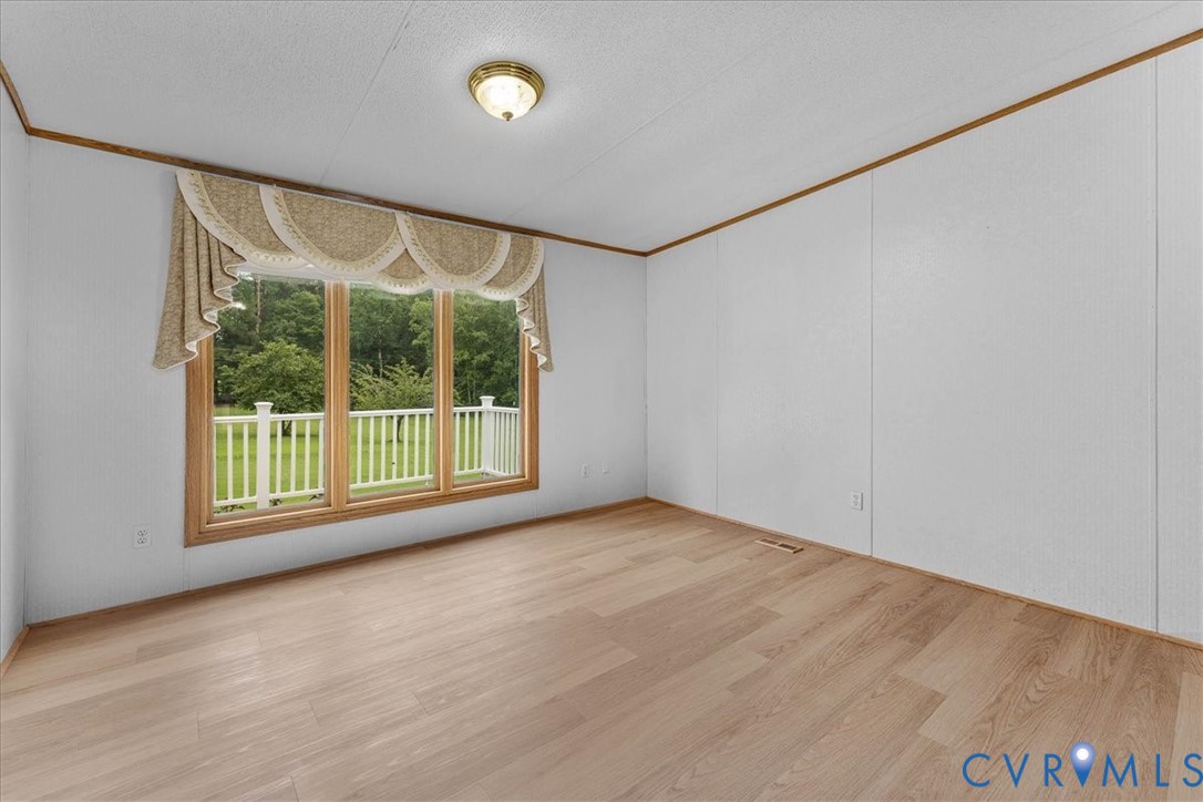 6626 Claiborne Road Sutherland, VA 23885 - Photo 11 of 37 Living room looking out over the beautiful front l
