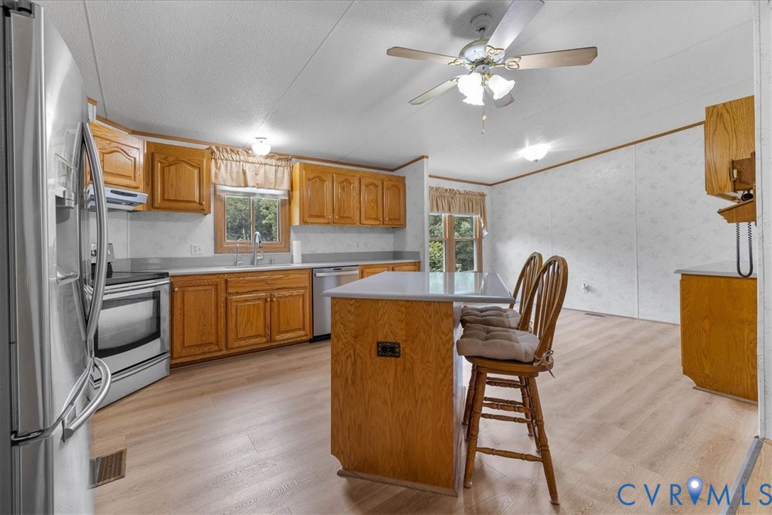 6626 Claiborne Road Sutherland, VA 23885 - Photo 14 of 37 Kitchen featuring stainless steel appliances, heal