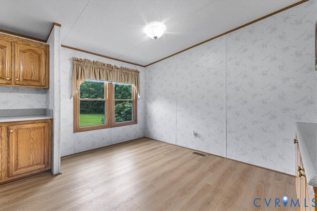 6626 Claiborne Road Sutherland, VA 23885 - Photo 17 of 37 Large dining area with good space for larger dinin