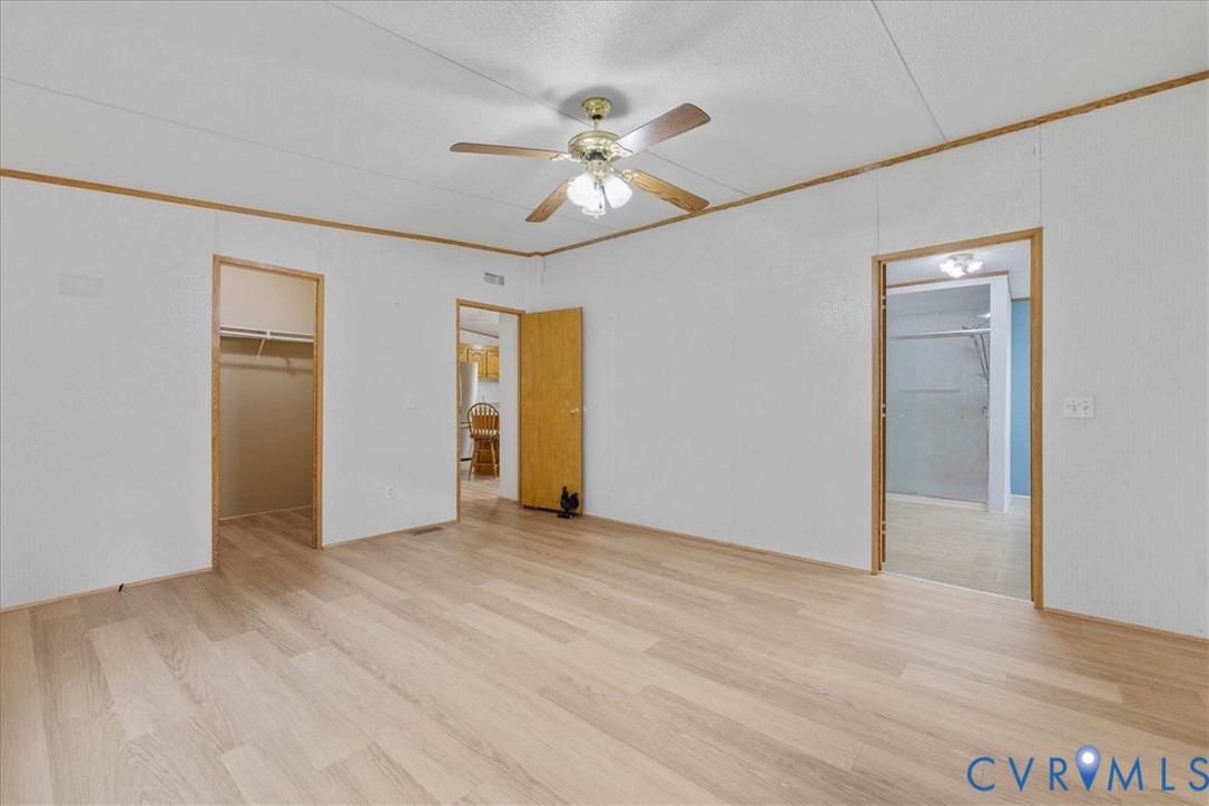 6626 Claiborne Road Sutherland, VA 23885 - Photo 21 of 37 Spacious primary bedroom looking into a nice walk-