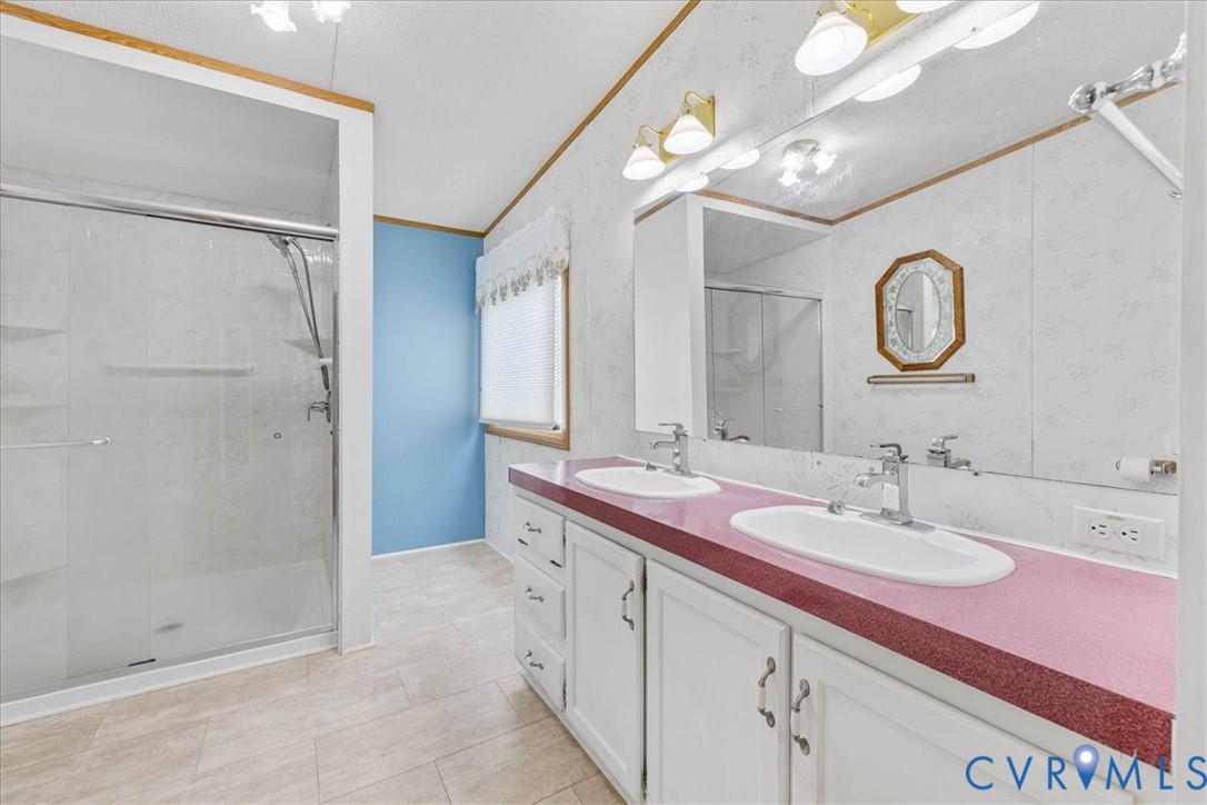 6626 Claiborne Road Sutherland, VA 23885 - Photo 22 of 37 Full bathroom featuring a shower with grab bar - s