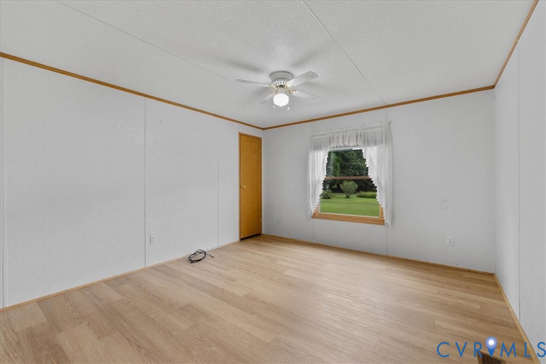 6626 Claiborne Road Sutherland, VA 23885 - Photo 23 of 37 Large 2nd bedroom on front of the home with walk i