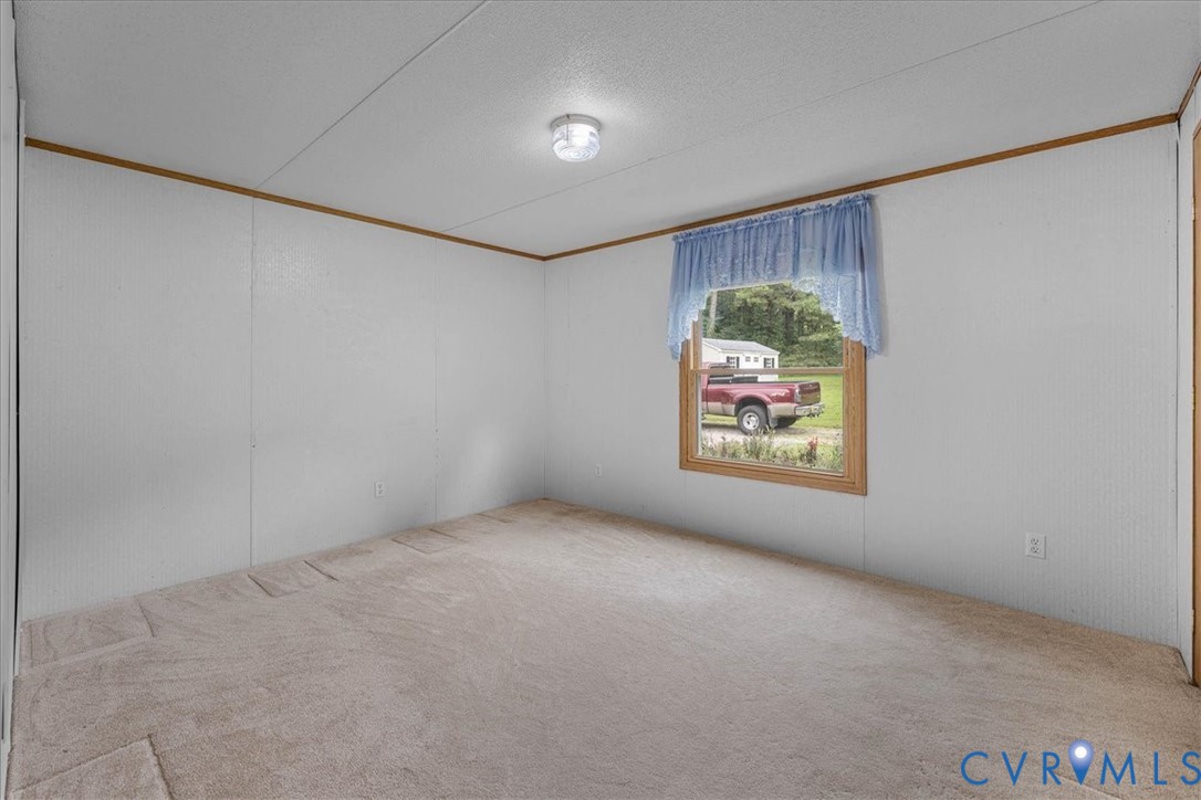 6626 Claiborne Road Sutherland, VA 23885 - Photo 25 of 37 3rd bedroom on back side of home overlooking drive
