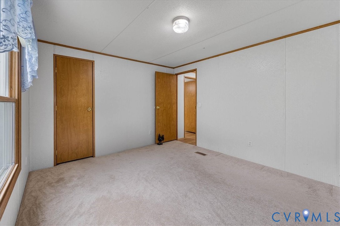 6626 Claiborne Road Sutherland, VA 23885 - Photo 26 of 37 3rd bedroom with walk in closet.