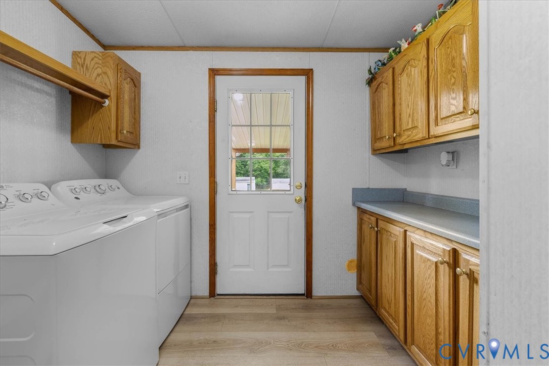 6626 Claiborne Road Sutherland, VA 23885 - Photo 28 of 37 Spacious laundry room with door leading to back, c