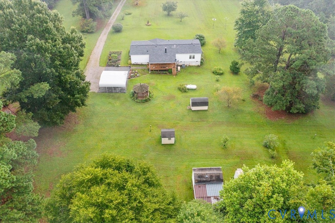 6626 Claiborne Road Sutherland, VA 23885 - Photo 37 of 37 Looking over the back yard and wooded area.