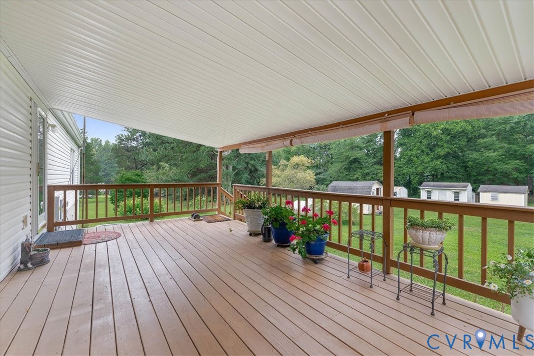 6626 Claiborne Road Sutherland, VA 23885 - Photo 7 of 37 Covered back deck with entry to either the laundry
