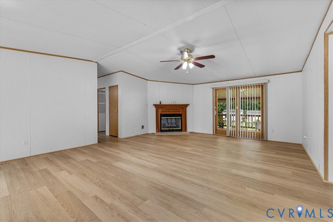 6626 Claiborne Road Sutherland, VA 23885 - Photo 9 of 37 Living room featuring light LVP flooring, a ceili