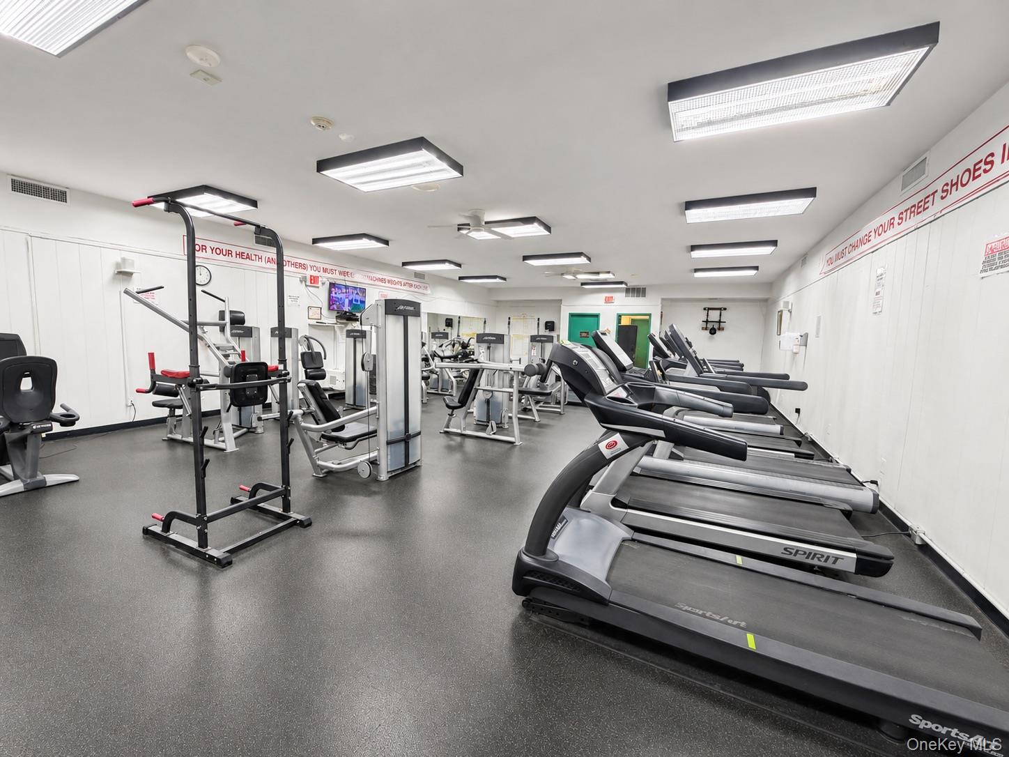 201 Birchwood Road, Unit 201 Coram, NY 11727 - Photo 25 of 27 a view of a room with gym equipment