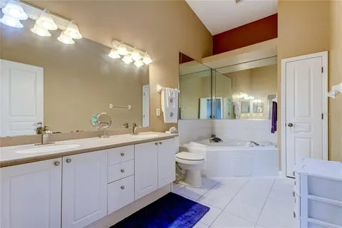 a view of a refrigerator in kitchen