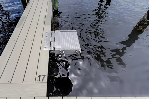 a view of swimming pool with seating space