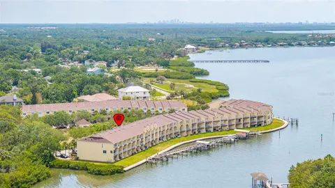 a lake view with a bench and lake view