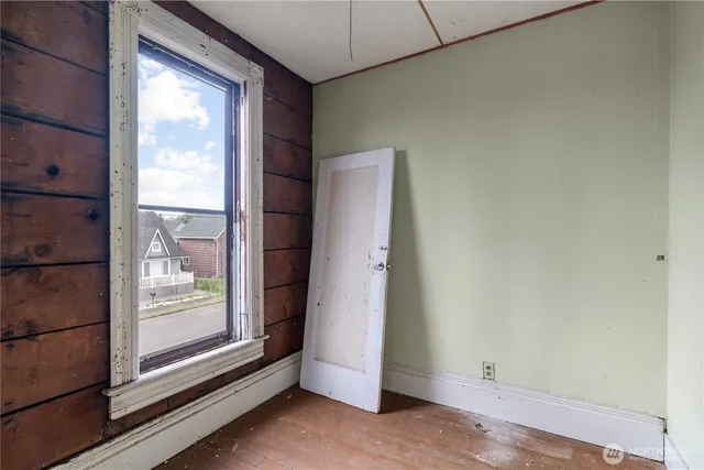 a house with trees in the background