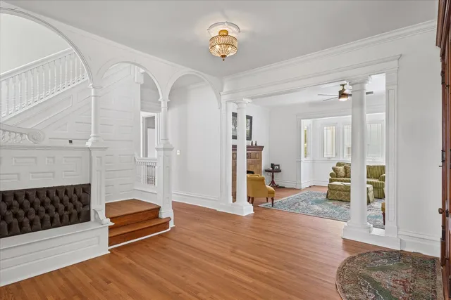 a living room with furniture or couch and a fireplace