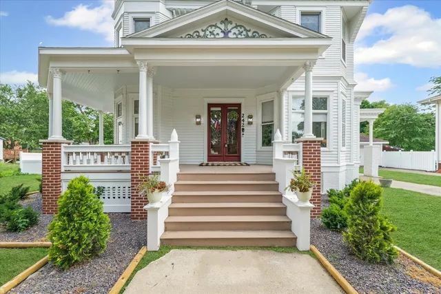 a view of a building with potted plants