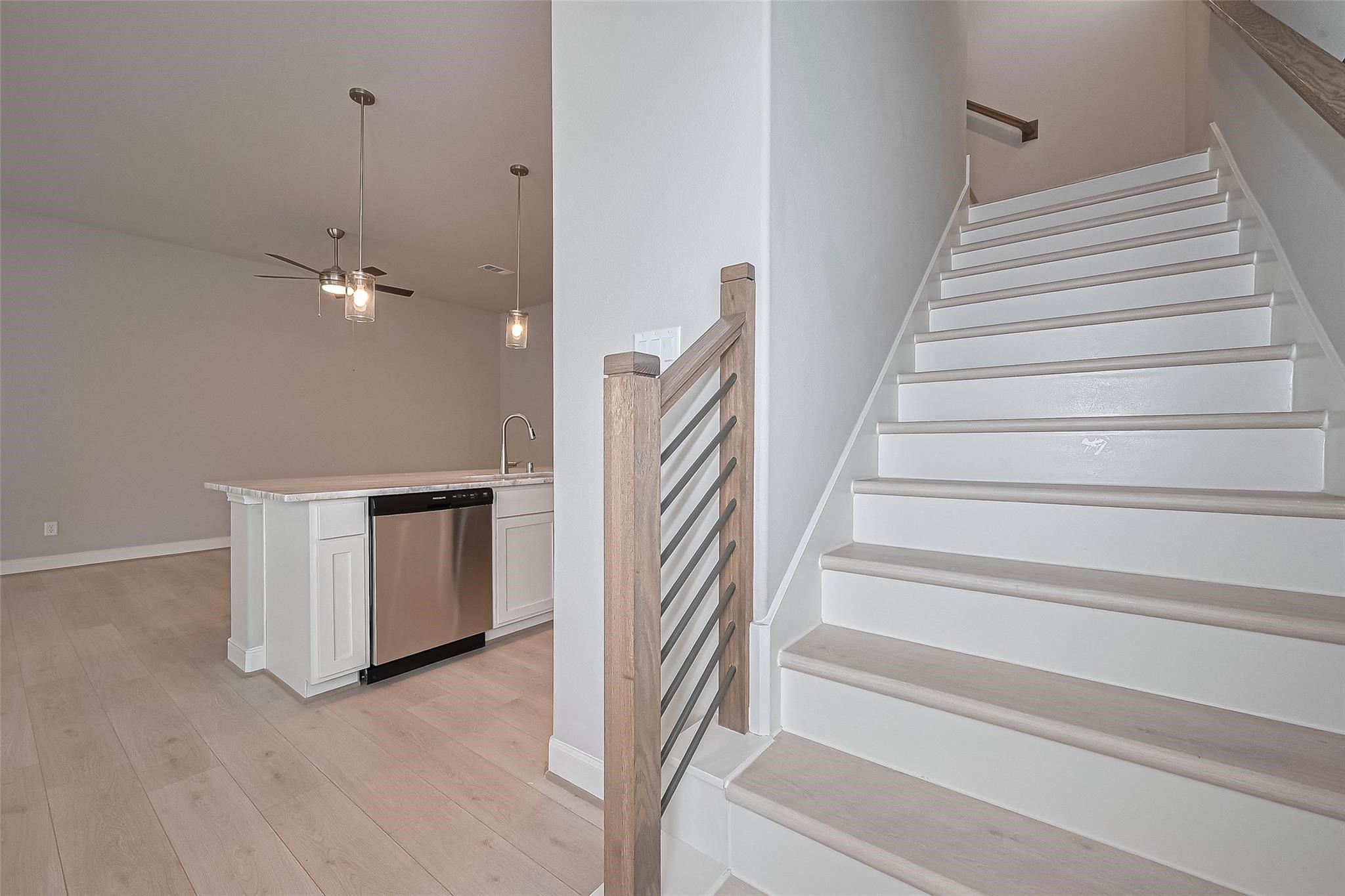 8933 Grovner Place Houston, TX 77080 - Photo 16 of 48 a view of entryway and hall with wooden floor