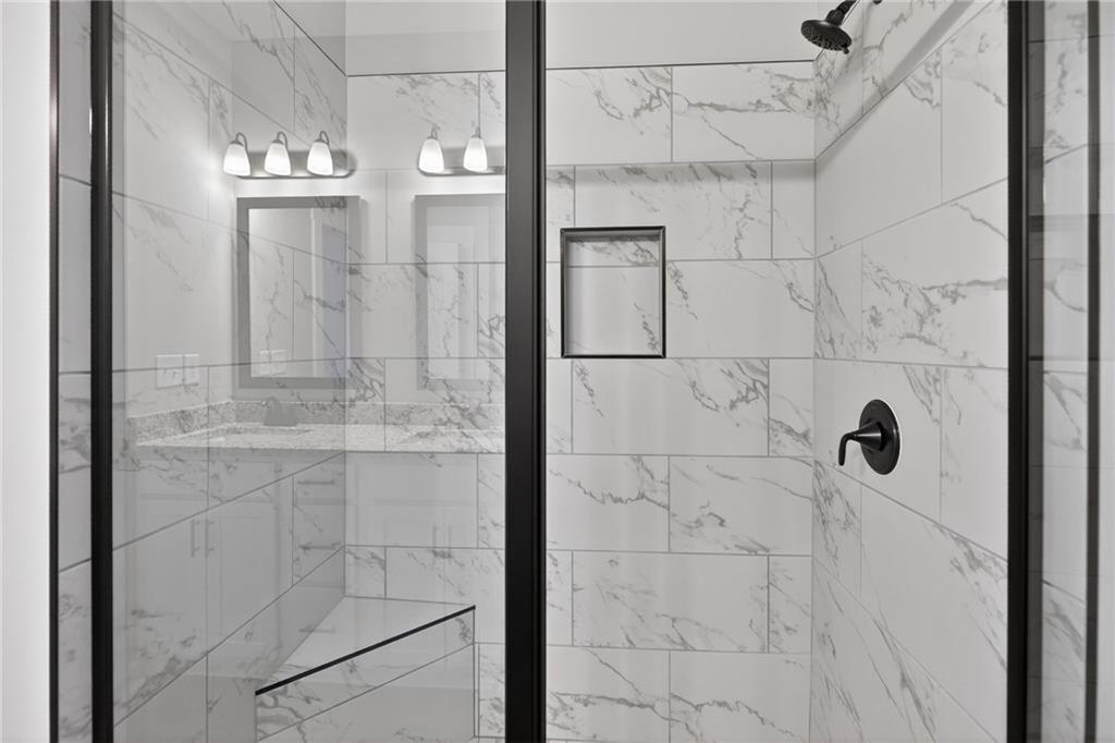 1549 Winn Road Douglasville, GA 30134 - Photo 25 of 36 a bathroom with a shower