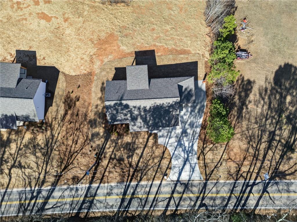 1549 Winn Road Douglasville, GA 30134 - Photo 33 of 36 a front view of a house with a yard