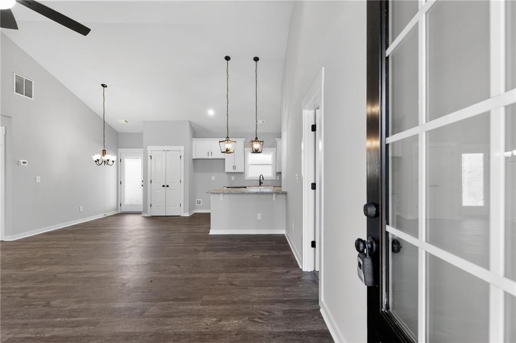 1549 Winn Road Douglasville, GA 30134 - Photo 10 of 36 a view of a hallway with wooden floor