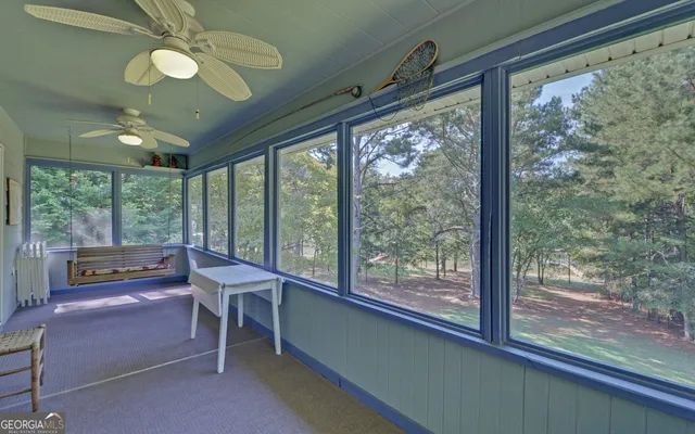 a view of entryway wih livingroom and stairs