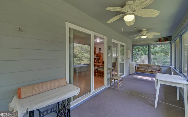 a living room with furniture fireplace and flat screen tv