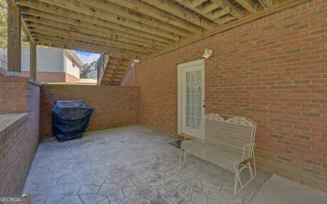 a view of a yard with large trees