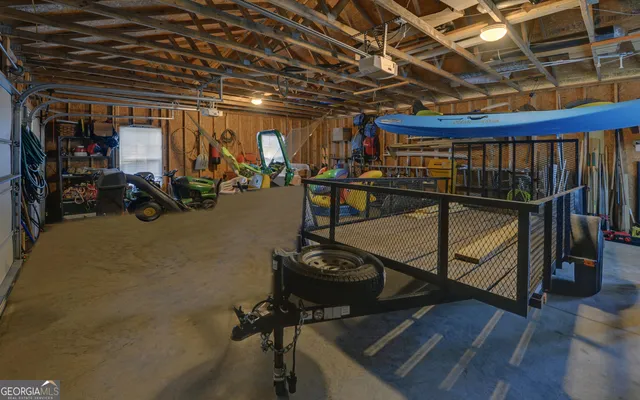 a view of a swimming pool with an outdoor space and seating area